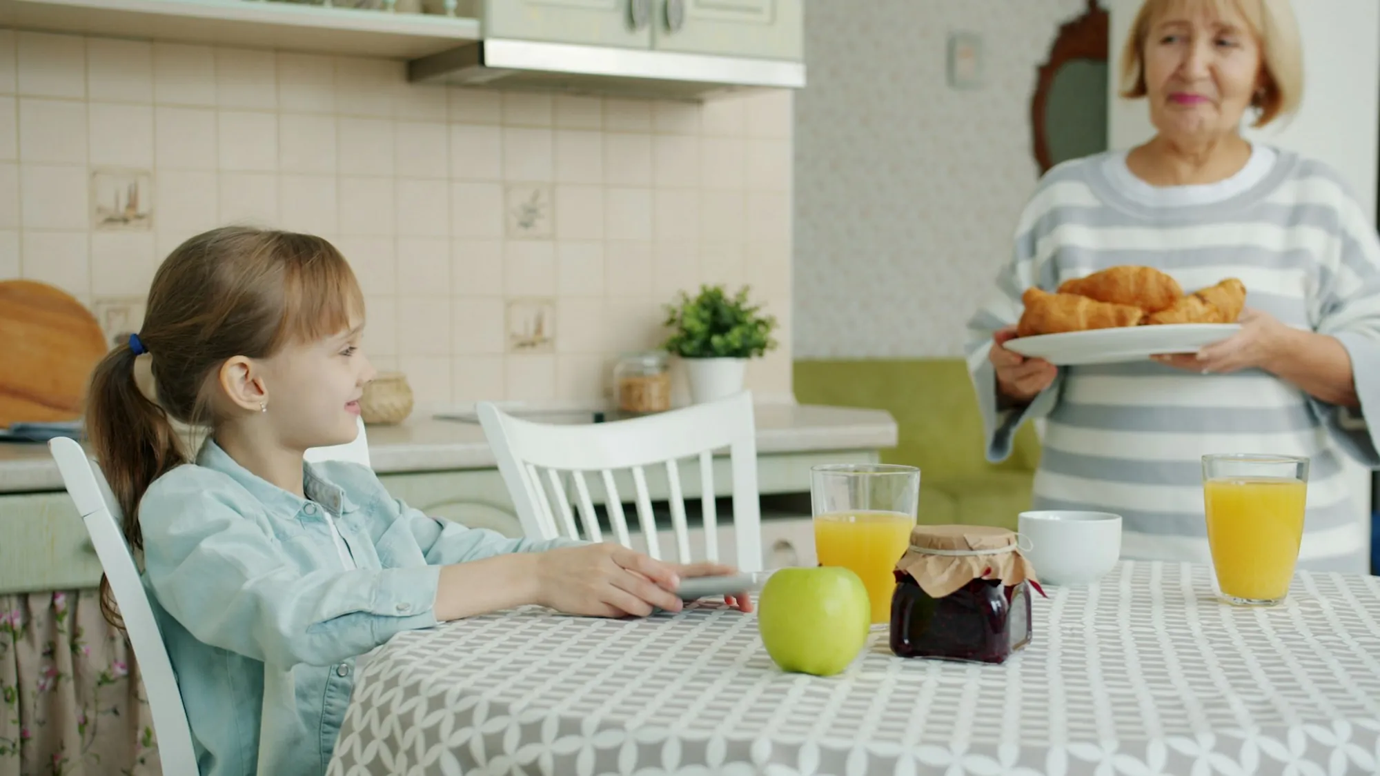 Two people preparing lunch together in a kitchen